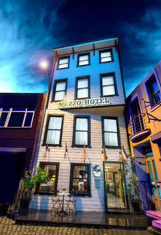 a blue and white building with a hotel at Mezzo Hotel in Istanbul