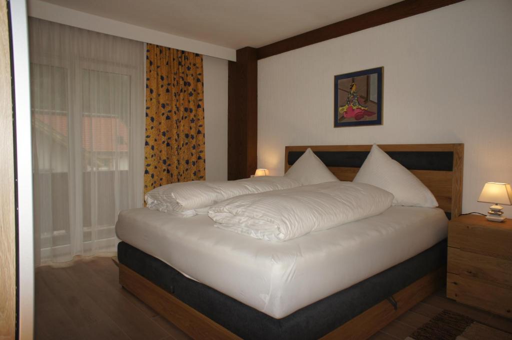 Posteľ alebo postele v izbe v ubytovaní Appartements Gärtner