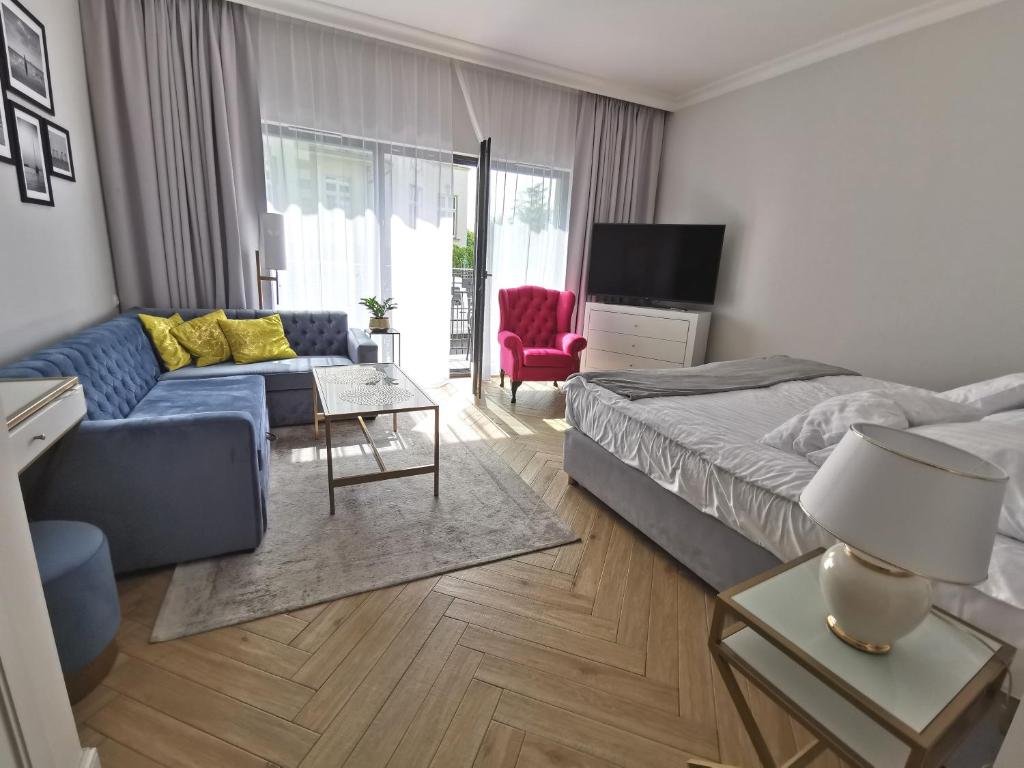 Televízia a/alebo spoločenská miestnosť v ubytovaní Apartament Międzyzdroje 006 w Maritime Residence