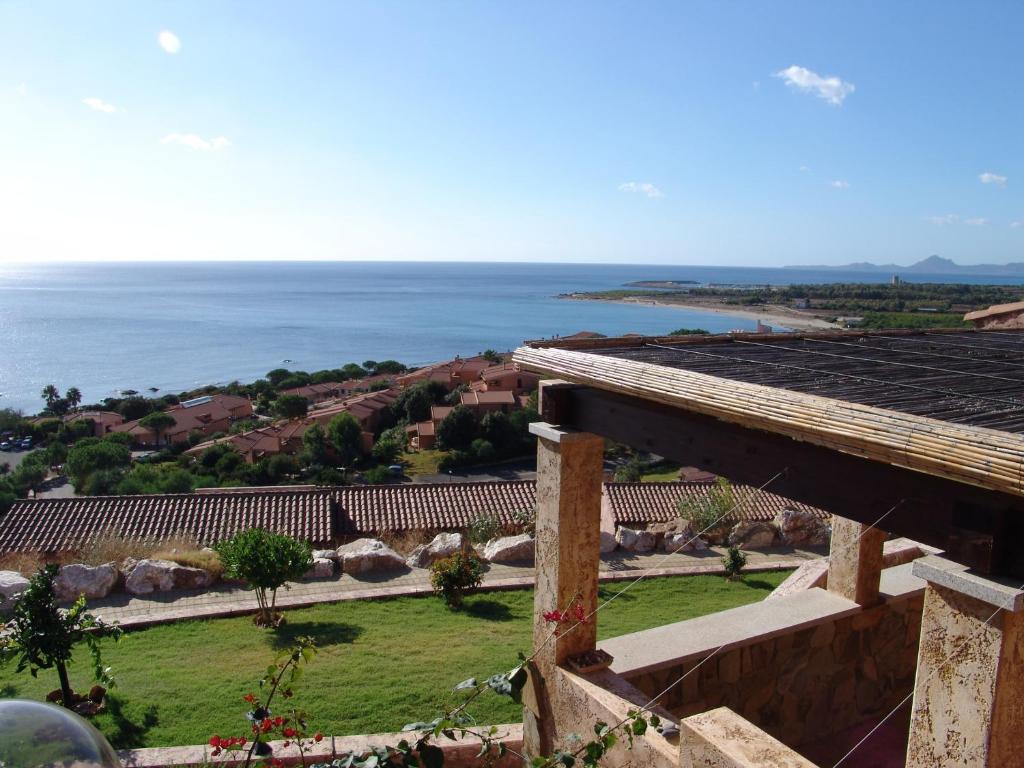 a view of the ocean from a house at Le Residenze di Porto Corallo in Villaputzu