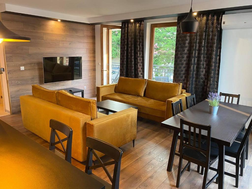 Posedenie v ubytovaní Apartamenty Pod Jesionem