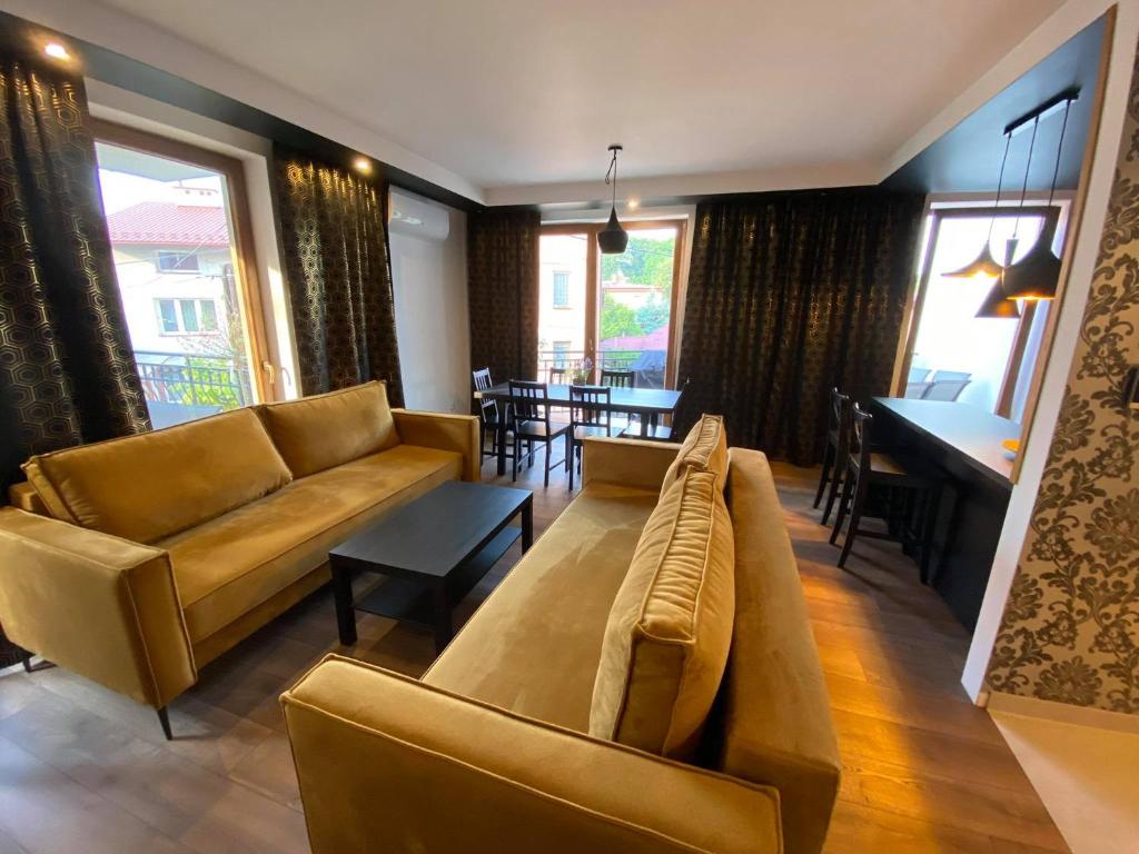 Posedenie v ubytovaní Apartamenty Pod Jesionem