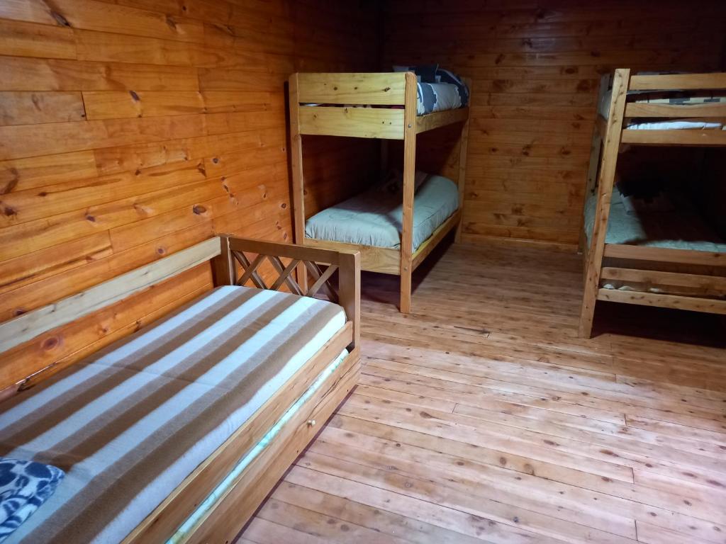 Postel nebo postele na pokoji v ubytování Refugio Ventana