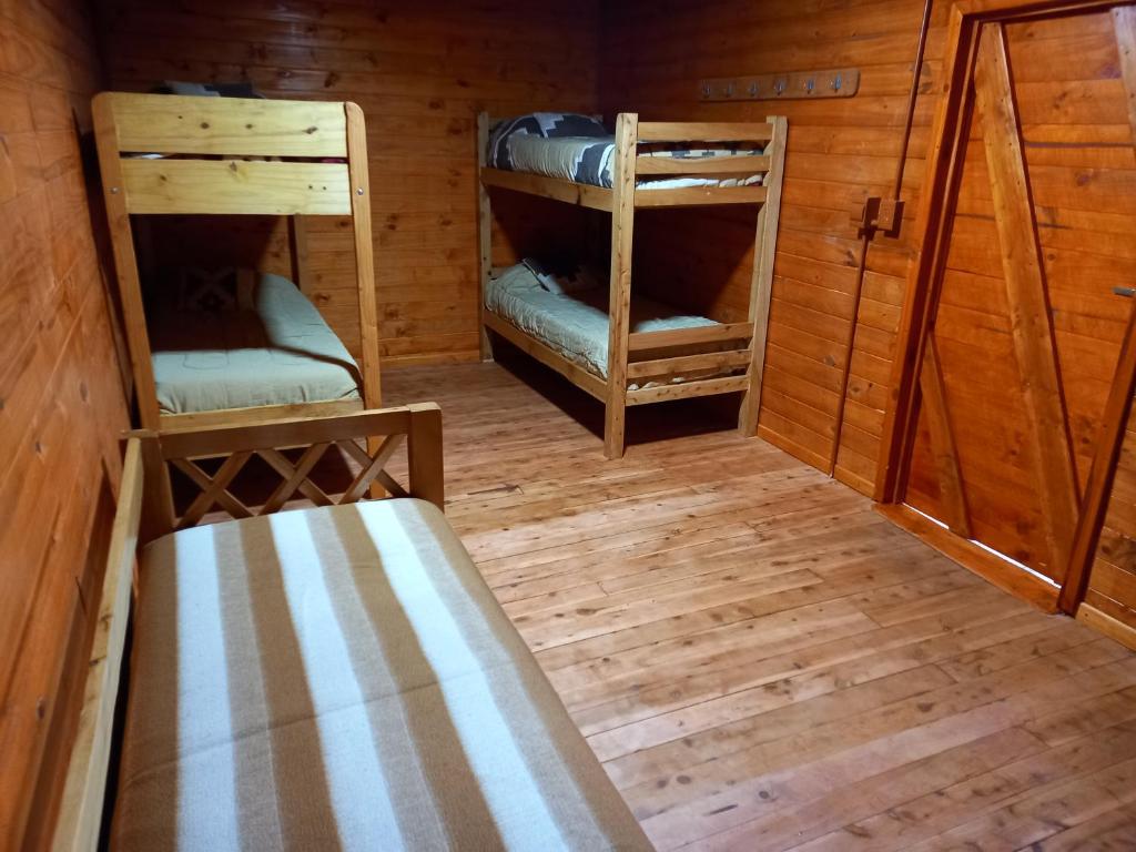 Postel nebo postele na pokoji v ubytování Refugio Ventana