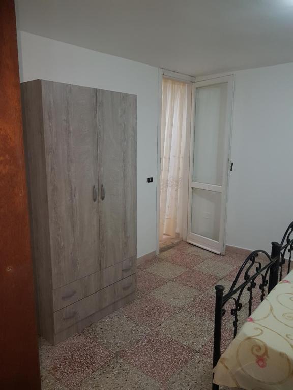 Postel nebo postele na pokoji v ubytování casa al mare kalispera