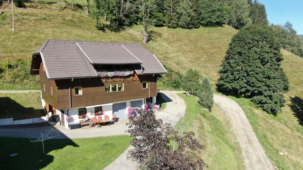 an overhead view of a house on a hill at Appartement VIDMAR-WINTERTRAUM in Arriach