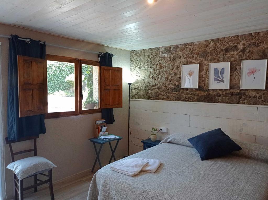 Postel nebo postele na pokoji v ubytování Mas Violella allotjament rural