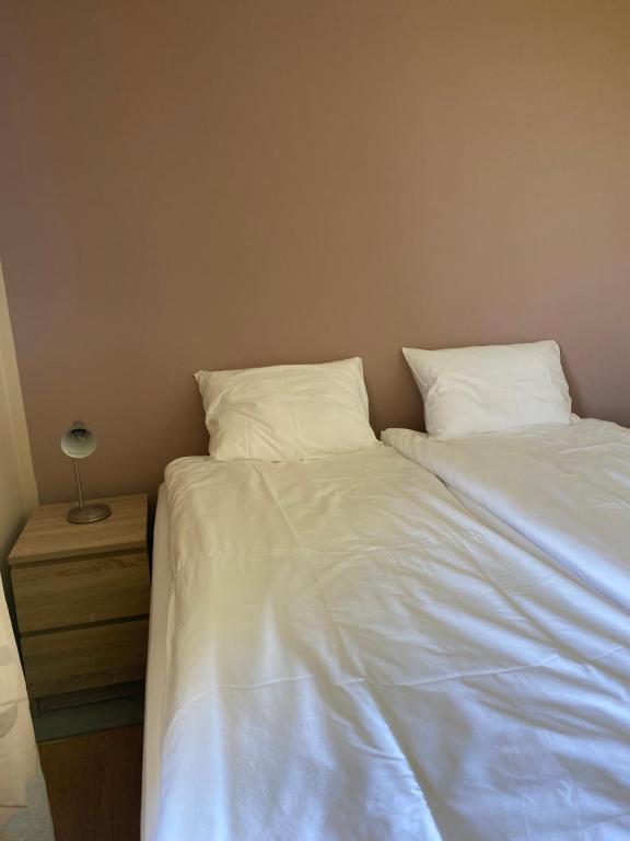 Postel nebo postele na pokoji v ubytování Syðstibær Guesthouse