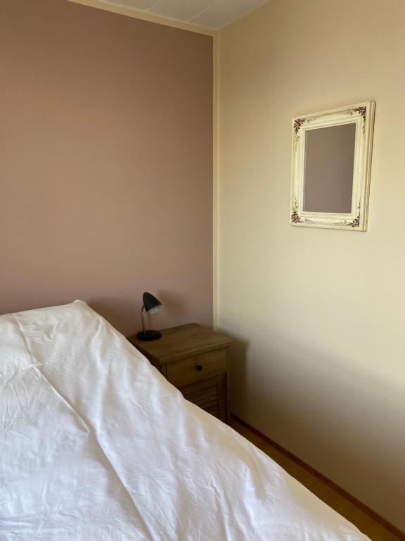 Postel nebo postele na pokoji v ubytování Syðstibær Guesthouse