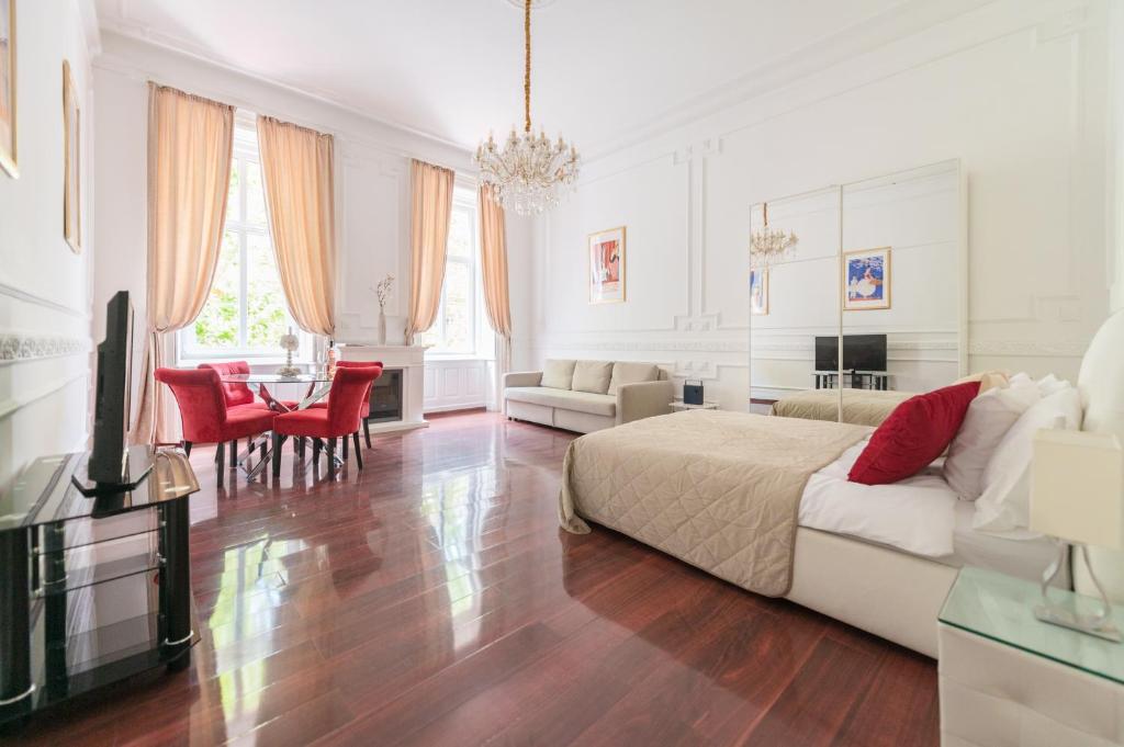 Televízia a/alebo spoločenská miestnosť v ubytovaní Music Academy Suite Café Vian Apartman Kft