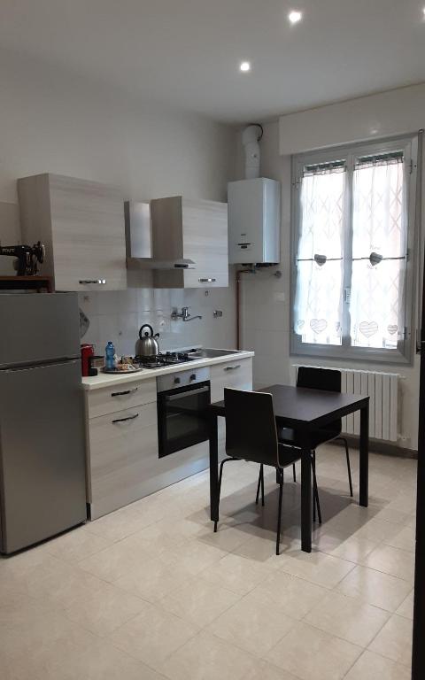 A kitchen or kitchenette at House Passarotti, 21