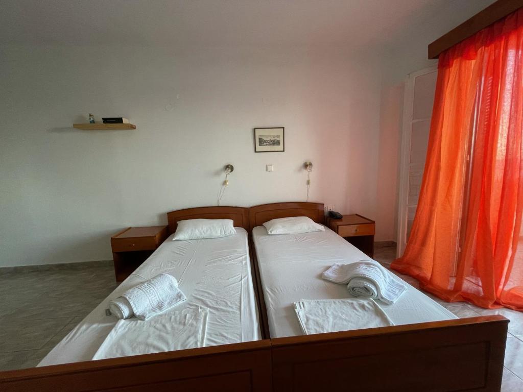 Letto o letti in una camera di Apollon Hotel
