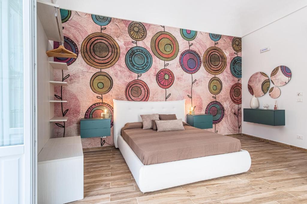 Posteľ alebo postele v izbe v ubytovaní FLOWER SUITE B&B
