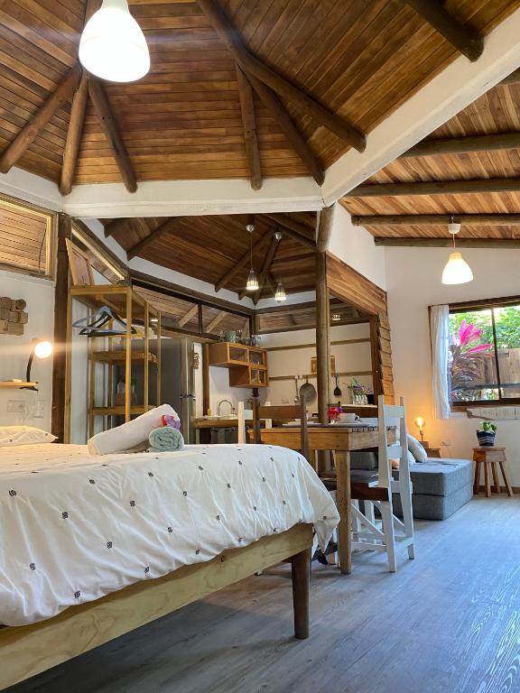 Llit o llits en una habitació de Ginger Studio