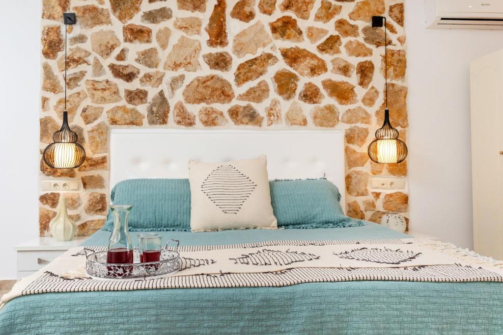 Posteľ alebo postele v izbe v ubytovaní GOLDEN COAST NAXOS