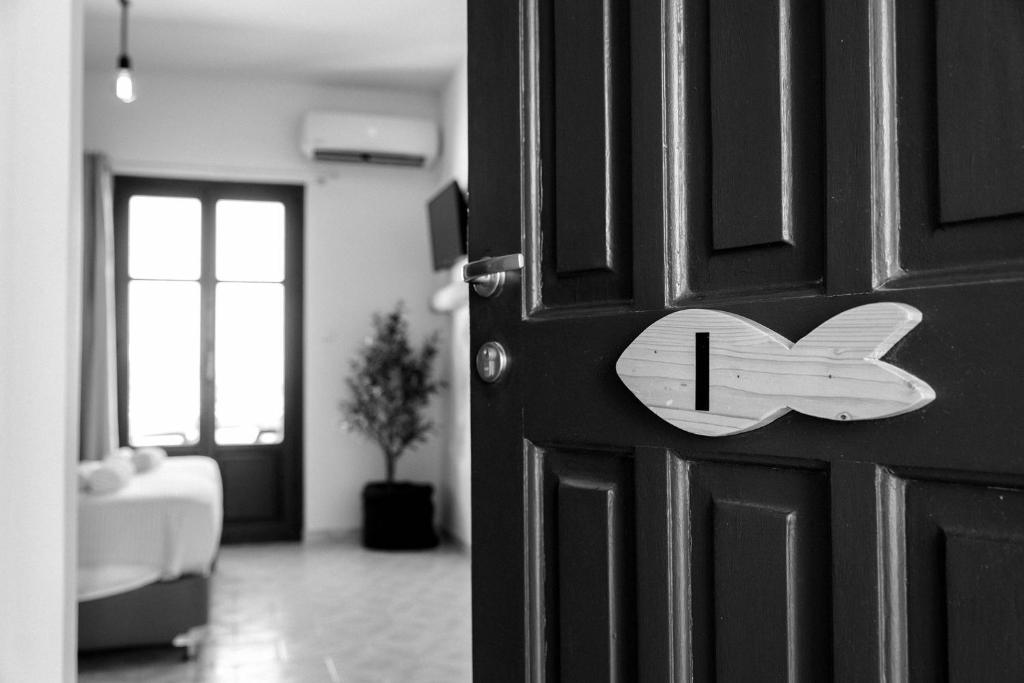 Postel nebo postele na pokoji v ubytování Ragoussis Sweet Rooms