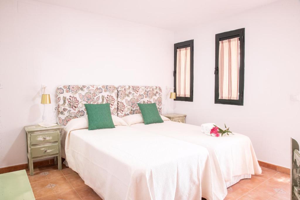 Postel nebo postele na pokoji v ubytování Hotel Marhava