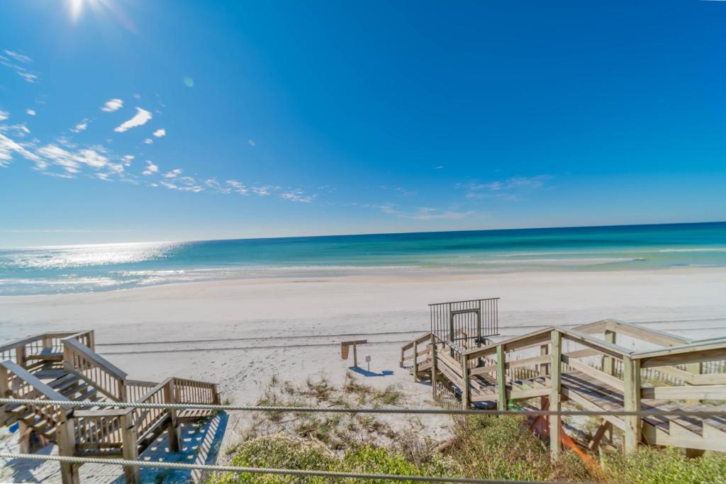 a view of the beach from the balcony of a beach house at Highview Sunseekers 7 Condo in Santa Rosa Beach