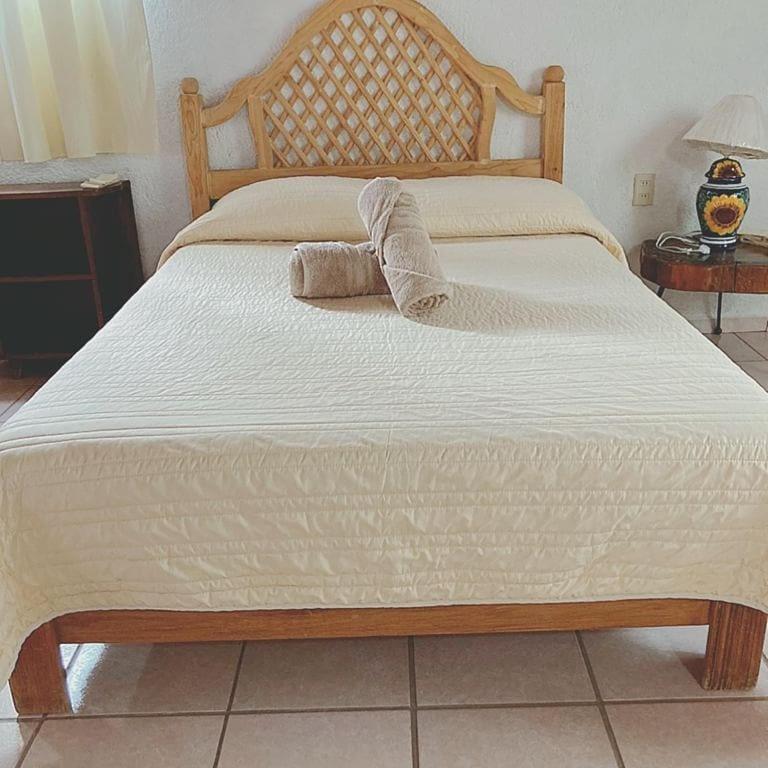 Postel nebo postele na pokoji v ubytování Manzano B&B