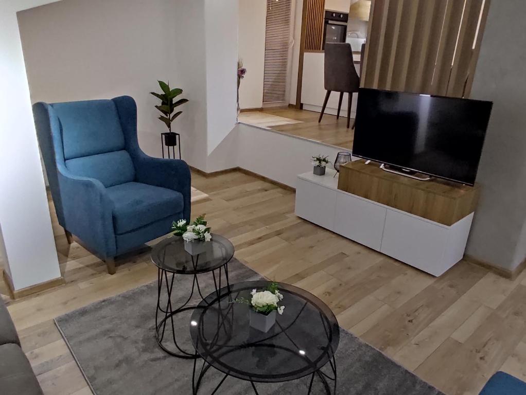 TV a/nebo společenská místnost v ubytování Sky Luxury