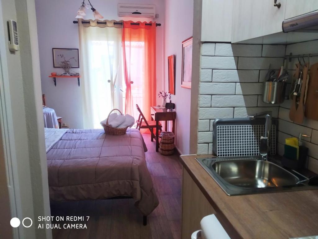 Postel nebo postele na pokoji v ubytování Violetta Rooms