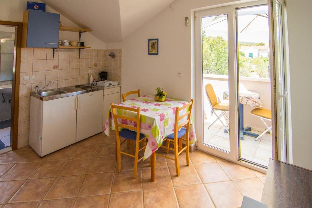 Кухня или мини-кухня в Villa Tereza
