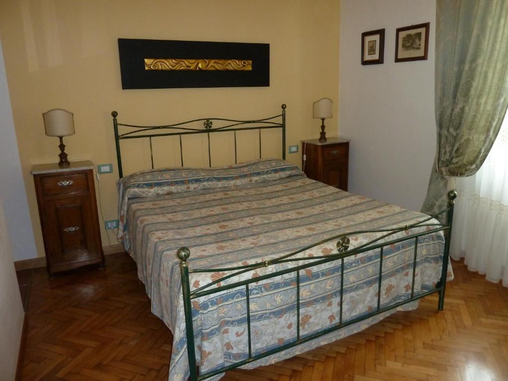 En eller flere senge i et værelse på Casa Titty