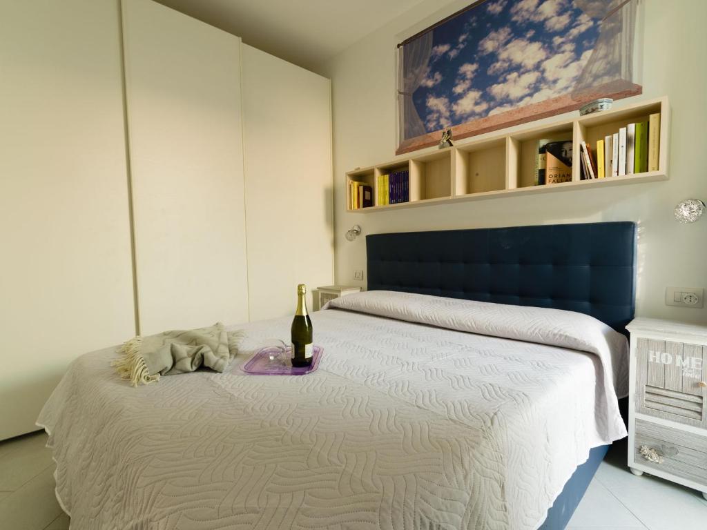 Letto o letti in una camera di Borgo dei Fiori - relax and sea view with swimming pool