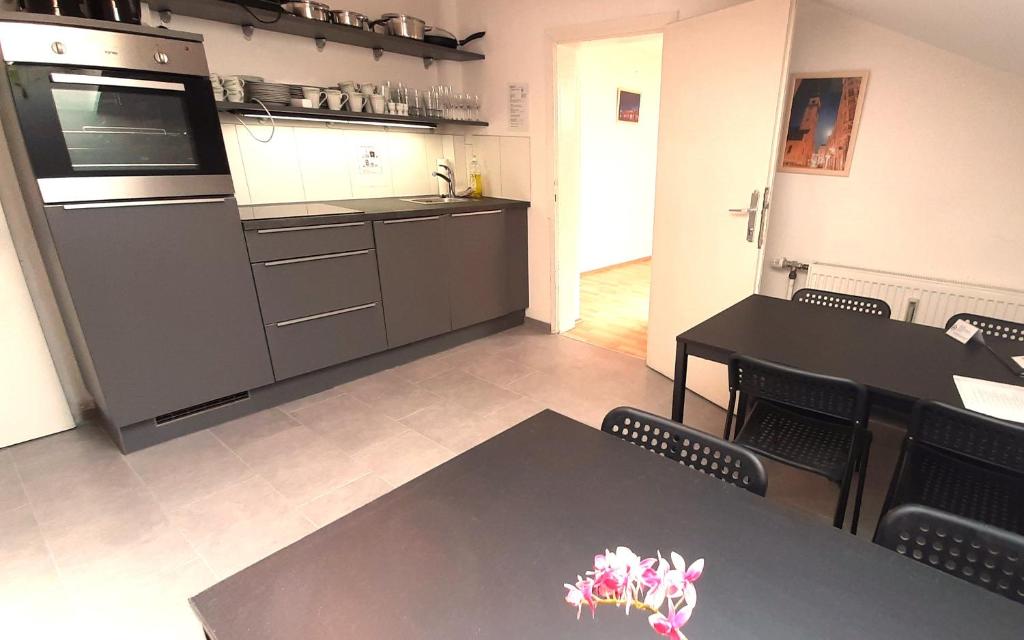 Kuchyňa alebo kuchynka v ubytovaní Apartments CITY Stadion