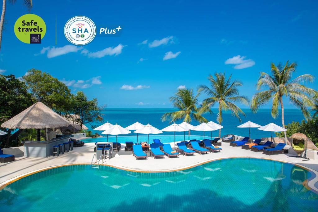 an image of a swimming pool with chairs and umbrellas at Coral Cliff Beach Resort Samui - SHA Plus in Chaweng Noi Beach