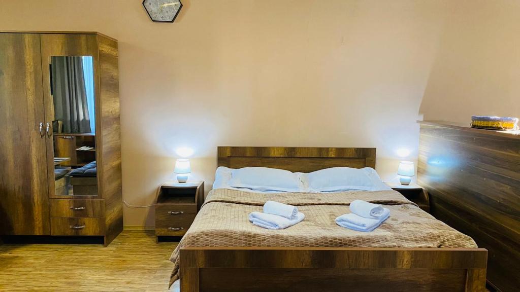 Postel nebo postele na pokoji v ubytování Lela Guest House