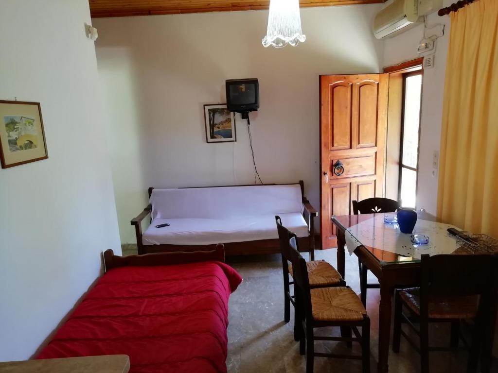 Postel nebo postele na pokoji v ubytování Kastraki Villas