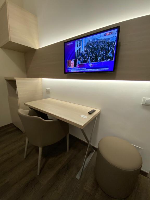 TV a/nebo společenská místnost v ubytování Hotel Parco Delle Rose