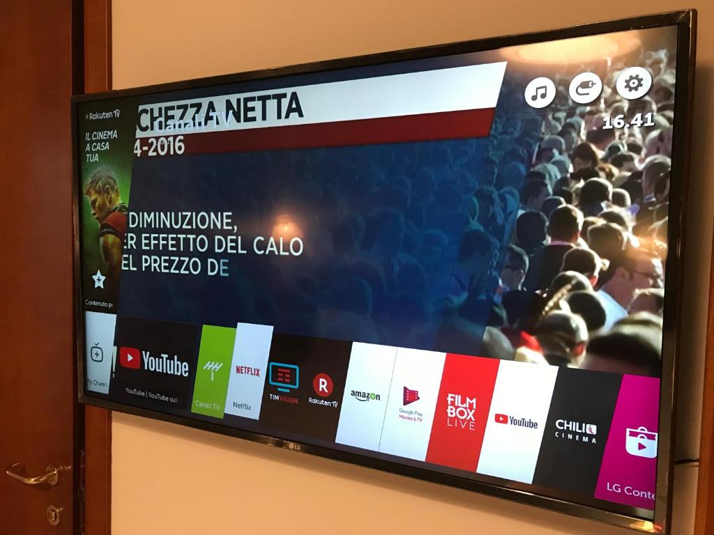 TV a/nebo společenská místnost v ubytování Hotel Parco Delle Rose