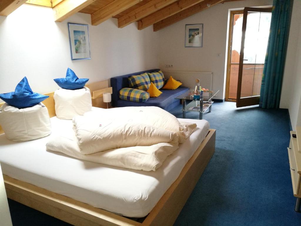 Postel nebo postele na pokoji v ubytování Haus Kristall