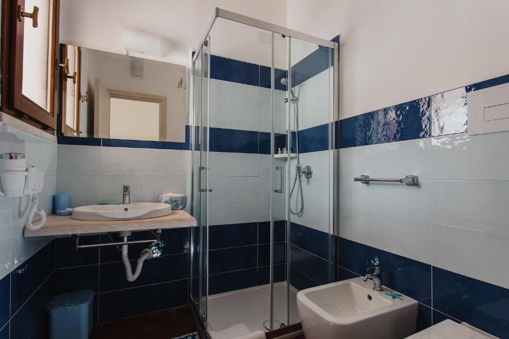 Koupelna v ubytování Resort Fior di Sardegna