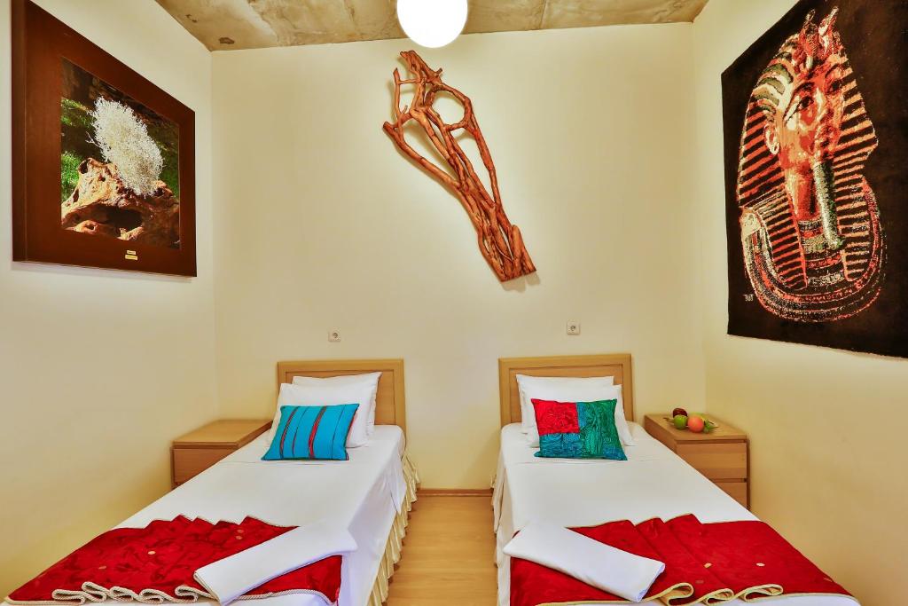 Postel nebo postele na pokoji v ubytování Han Hotel
