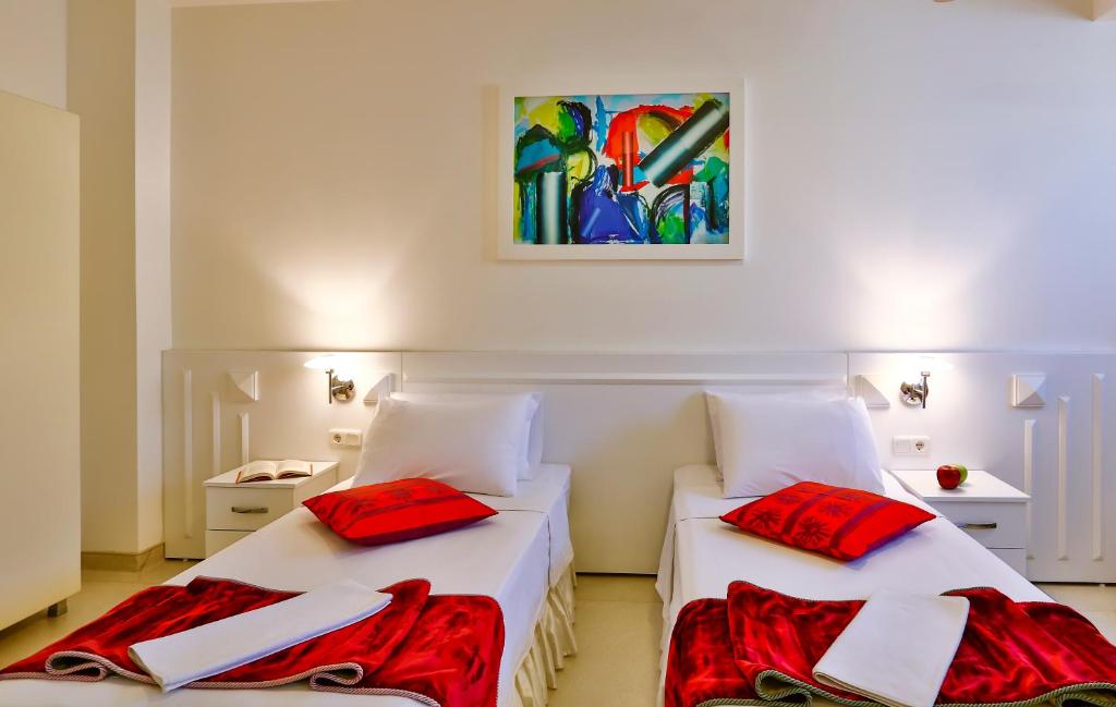 Postel nebo postele na pokoji v ubytování Han Hotel