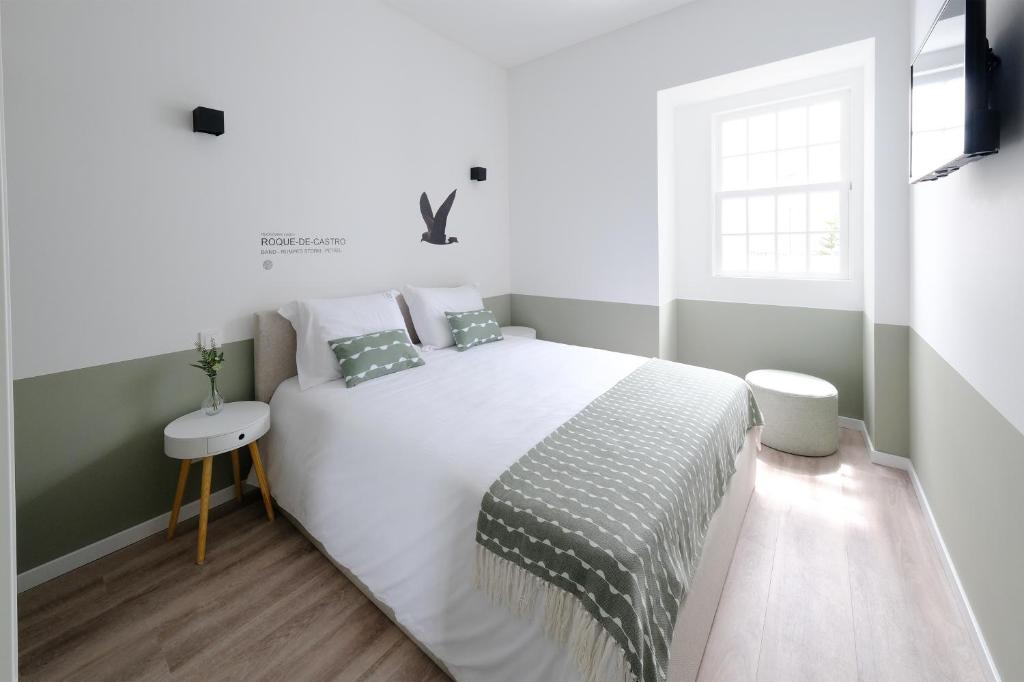 Postel nebo postele na pokoji v ubytování Boa Nova Hostel