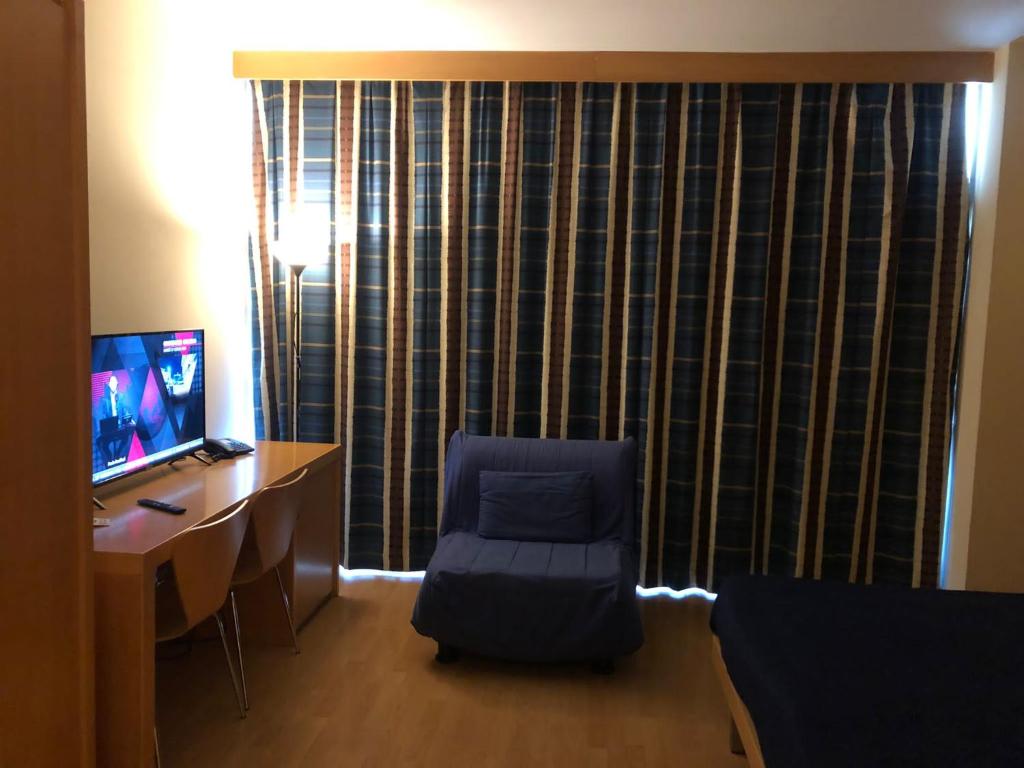 TV a/nebo společenská místnost v ubytování Hotel Ristorante Trendy