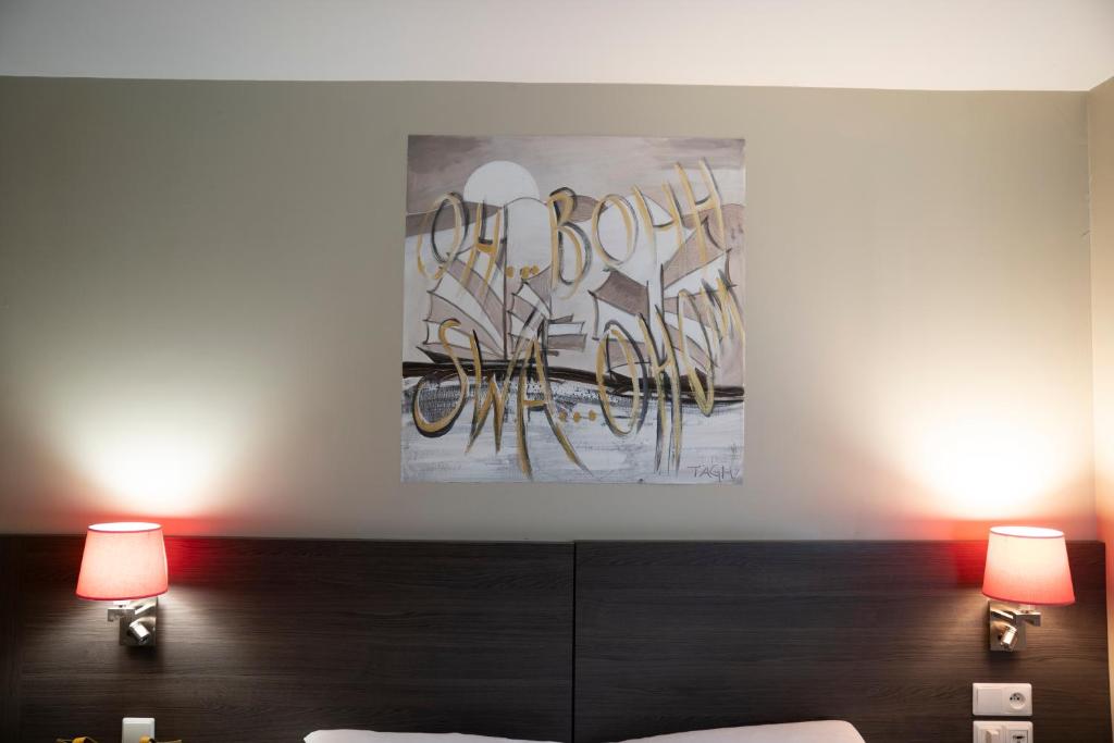 Postel nebo postele na pokoji v ubytování ibis Styles Compiegne