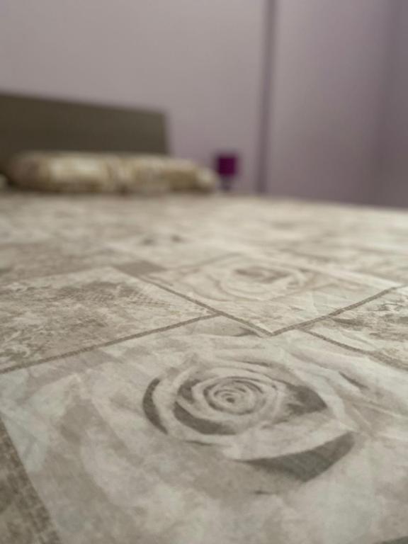 A bed or beds in a room at Appartamento La Chiesetta