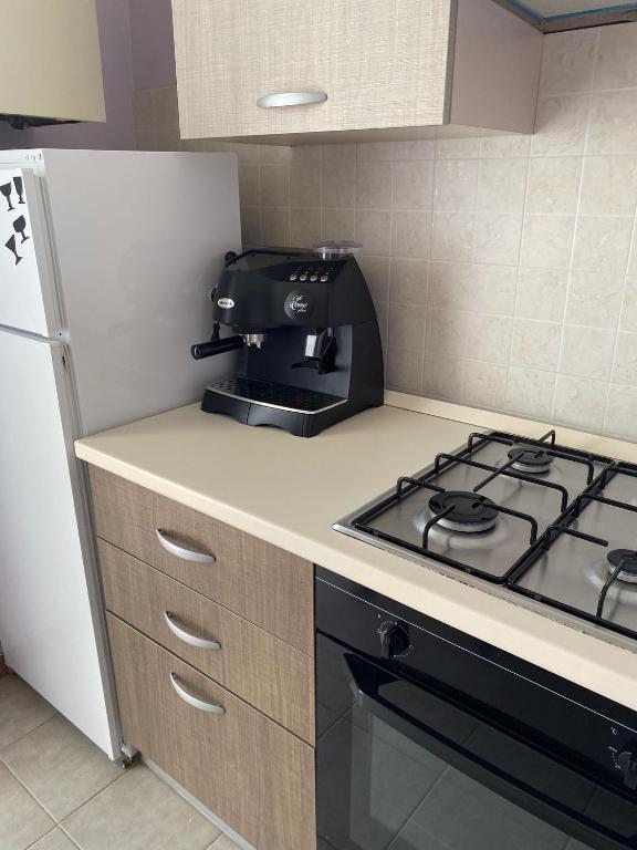 A kitchen or kitchenette at Appartamento La Chiesetta