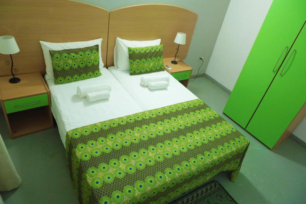 Postel nebo postele na pokoji v ubytování Hotel Casas do Sol