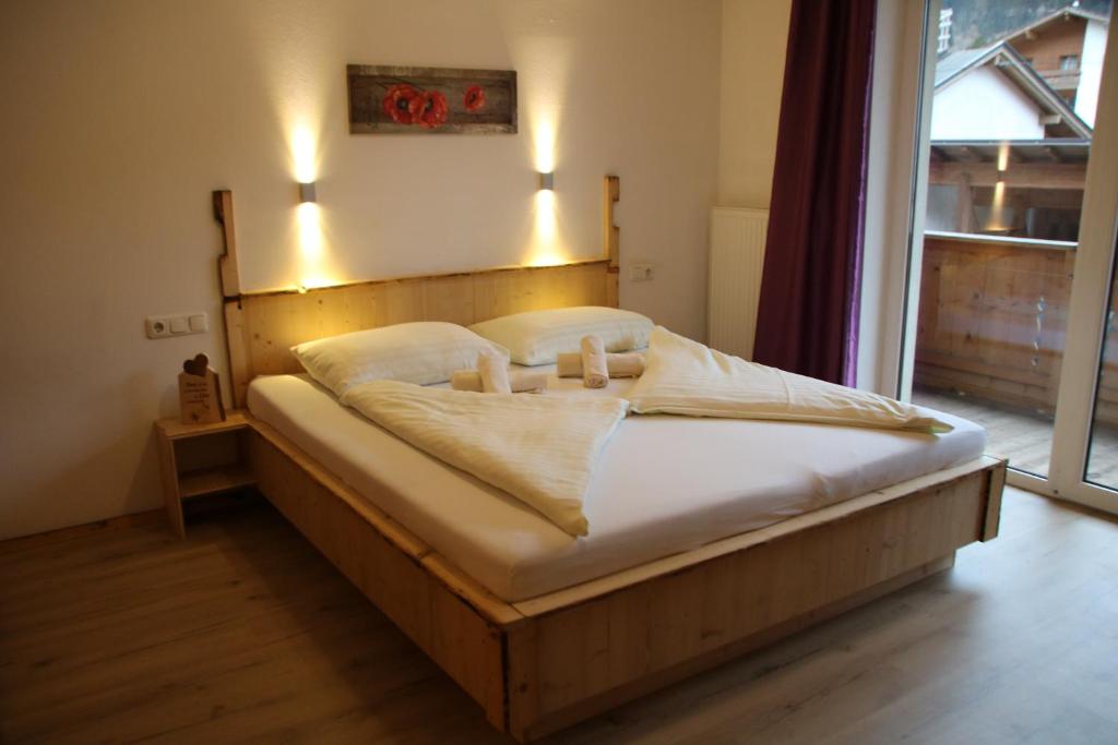 Ein Bett oder Betten in einem Zimmer der Unterkunft Gasthof zum Löwen