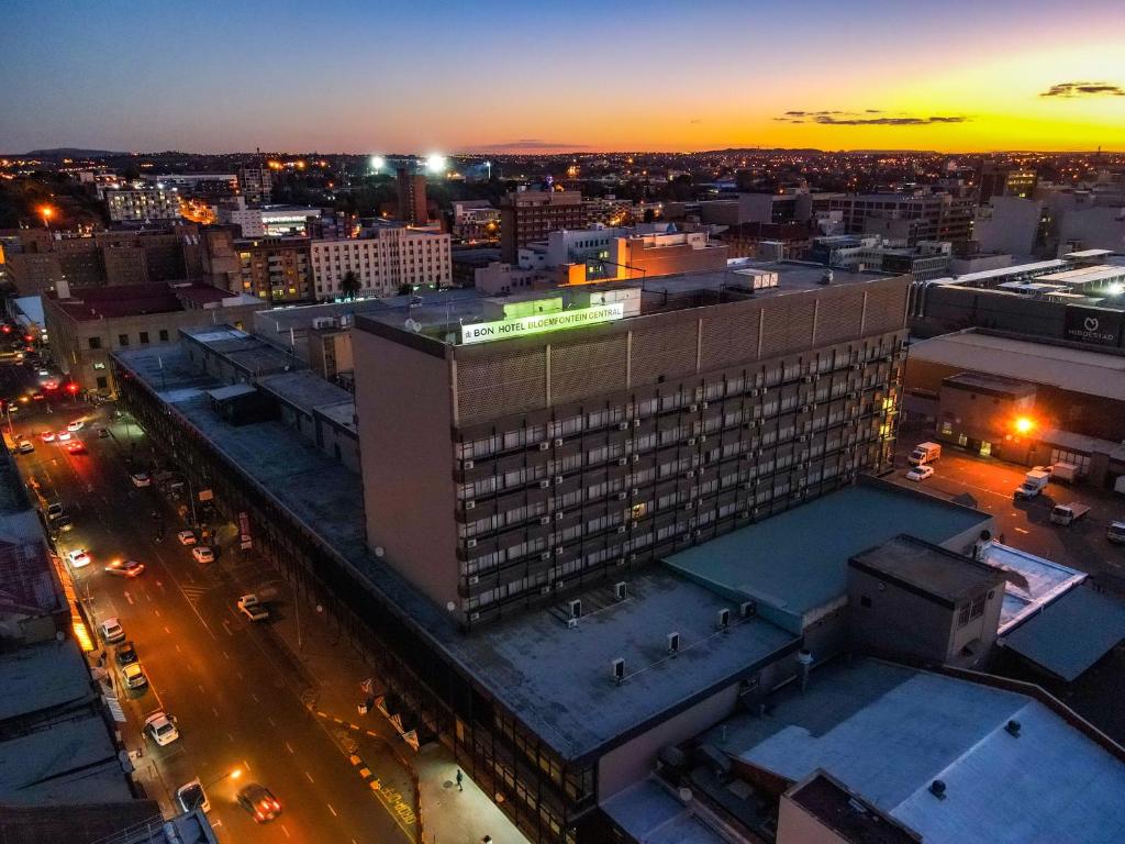 an overhead view of a city at night at BON Hotel Bloemfontein Central in Bloemfontein