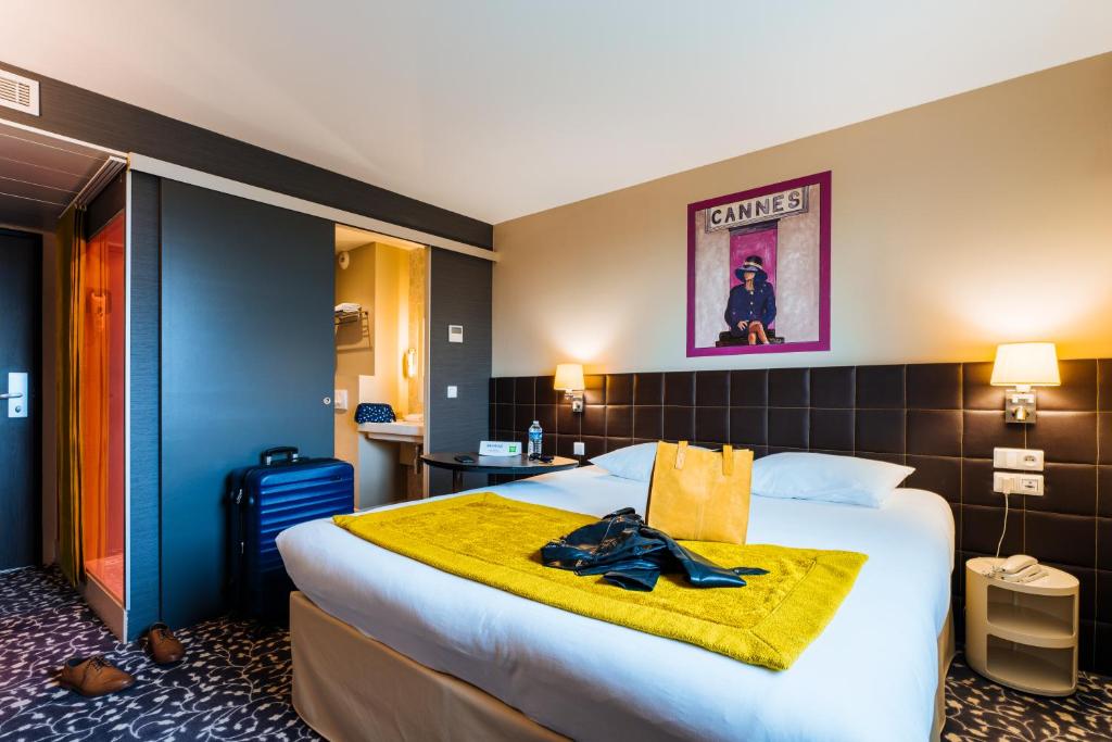 Postel nebo postele na pokoji v ubytování ibis Styles Compiegne