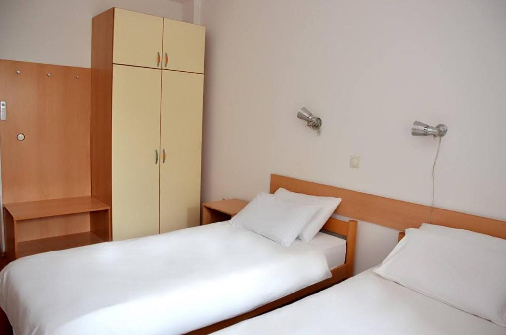 Postel nebo postele na pokoji v ubytování Hotel 7