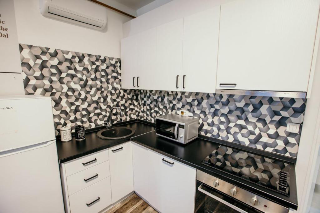 Kuchyň nebo kuchyňský kout v ubytování Sarajevo Stories Apartments Free Parking