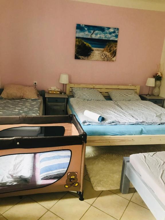 Postel nebo postele na pokoji v ubytování Apartmán U ŘEKY